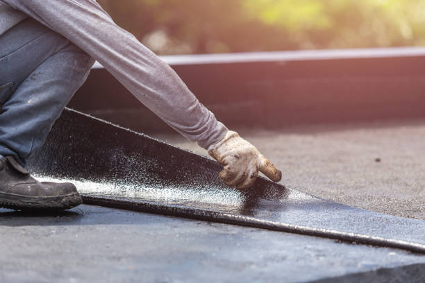 Professional Basement Waterproofing technician working in Kunkle, OH